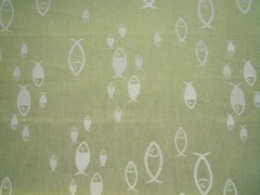 Tovagliolo, tessitura artigianale in misto lino/cotone, disegno con pesci di colore verde salvia, cm 40x40.