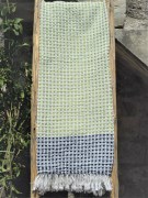 Telo mare tessitura artigianale in cotone naturale con rilievo a nido d'ape, colore verde e nero