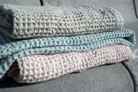 Telo mare tessitura artigianale in cotone naturale con rilievo a nido d'ape, colore verde e nero